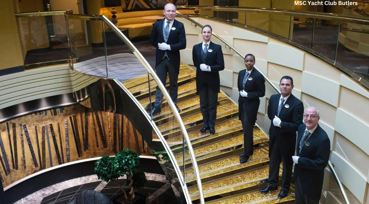 MSC Yacht Club Butlers on the Yacht Club Golden Swarovski staircase