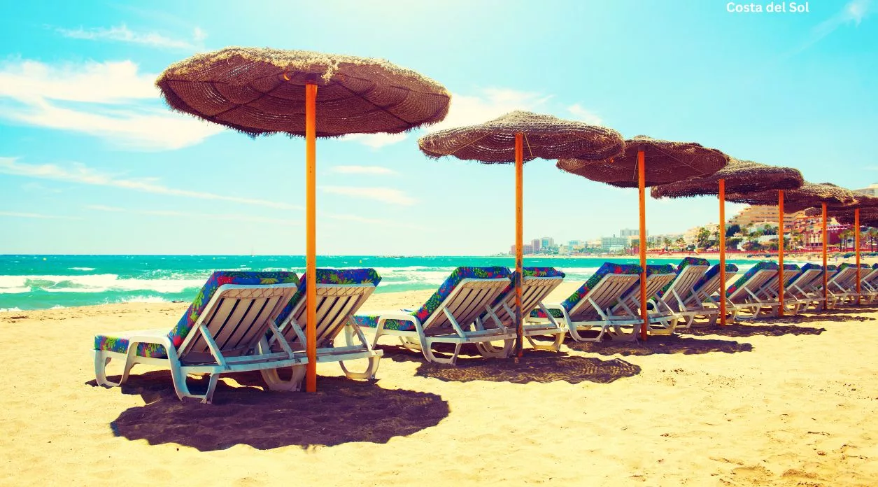 beach with sunshades on Costa Del Sol, Spain